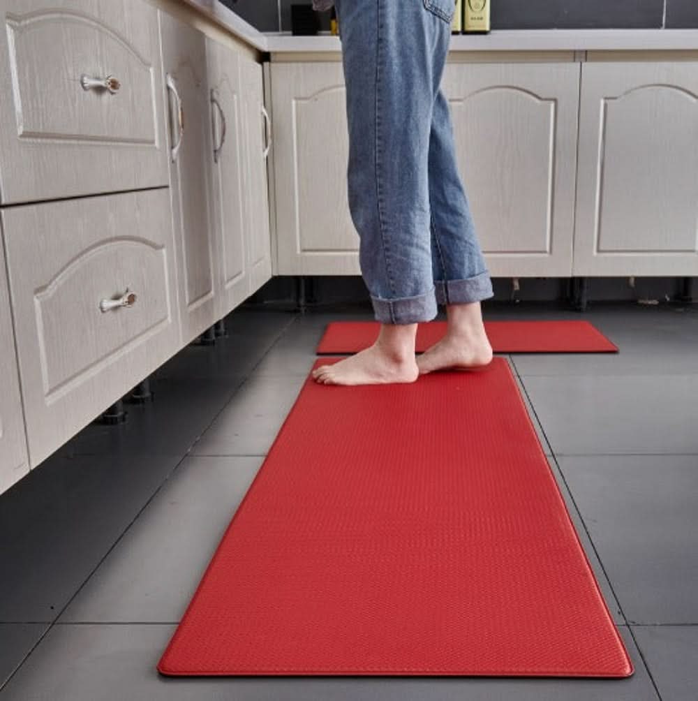 Ergonomic anti-fatigue kitchen mat with a non-slip surface, featuring a sleek modern design, ideal for providing comfort and support while cooking or standing 0